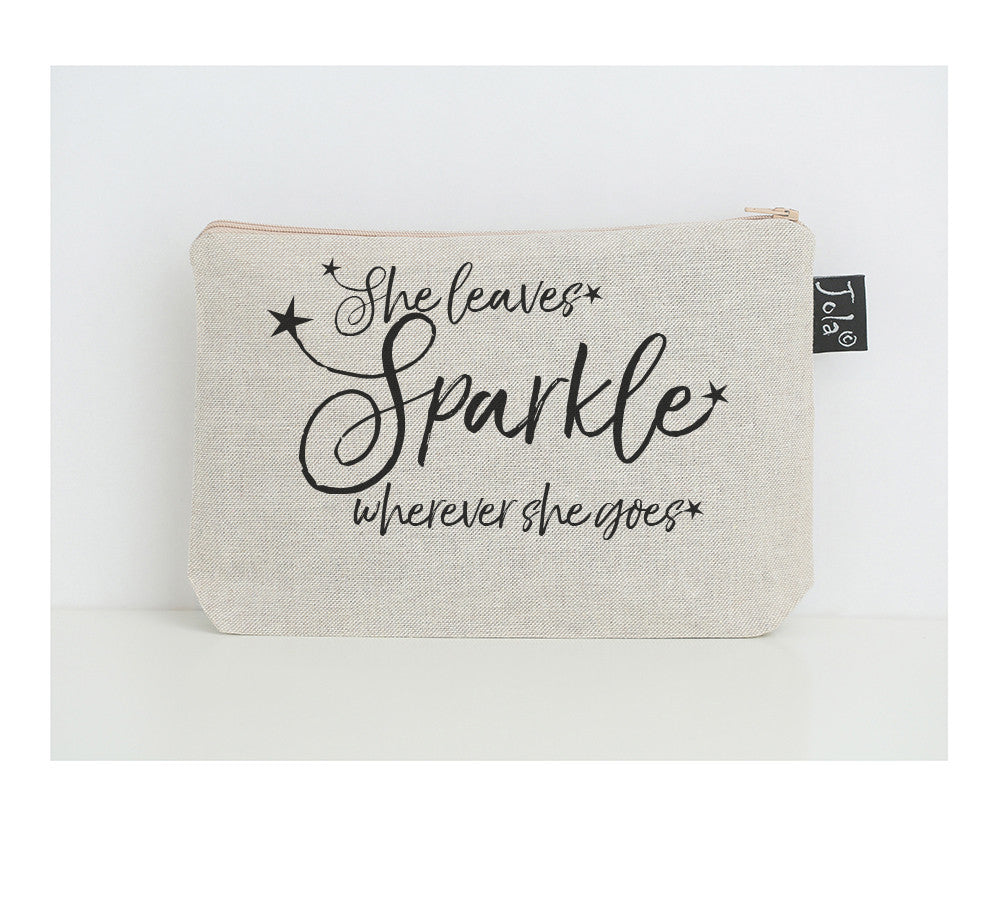 She leaves sparkle stars black small make up bag
